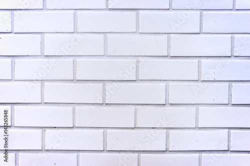 White brick wall textured background.