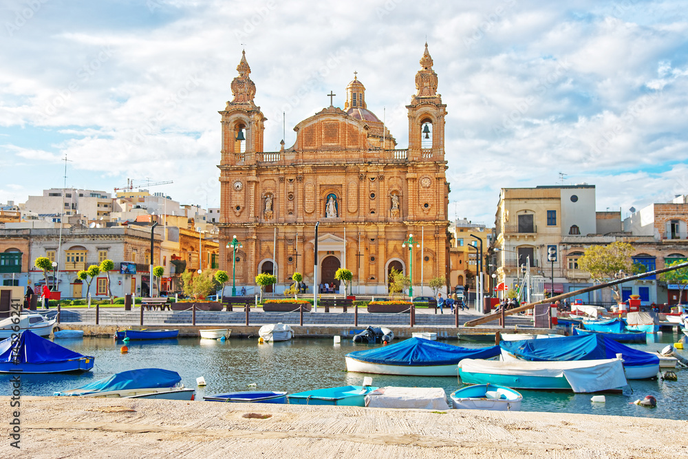 Parish Church at Msida marina with boats on Malta Island