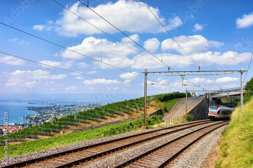 Train in Lavaux Vineyard Terraces near Lake Geneva Swiss Alps