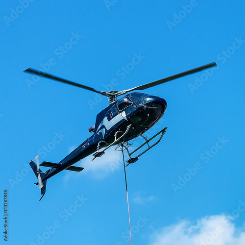 Helicopter flying in sky at Lavaux Switzerland