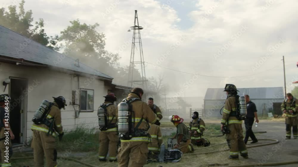 Firemen ourside of smoking house Firemen ourside of smoking house