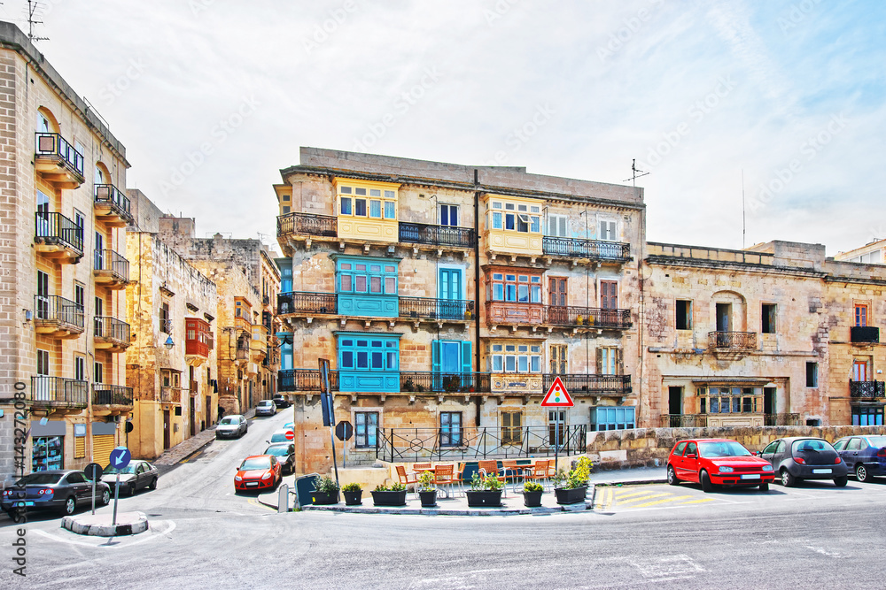 Colorful blue and yellow balconies in Valletta old town