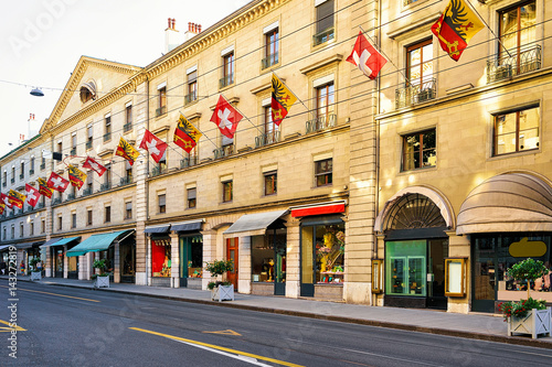 Rue Corraterie Street with Swiss flags Geneva photo