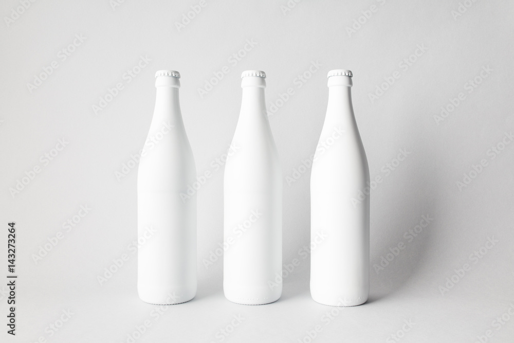 Three beer bottles on the scene, mock-up. Three beer bottles on the scene, mock-up.