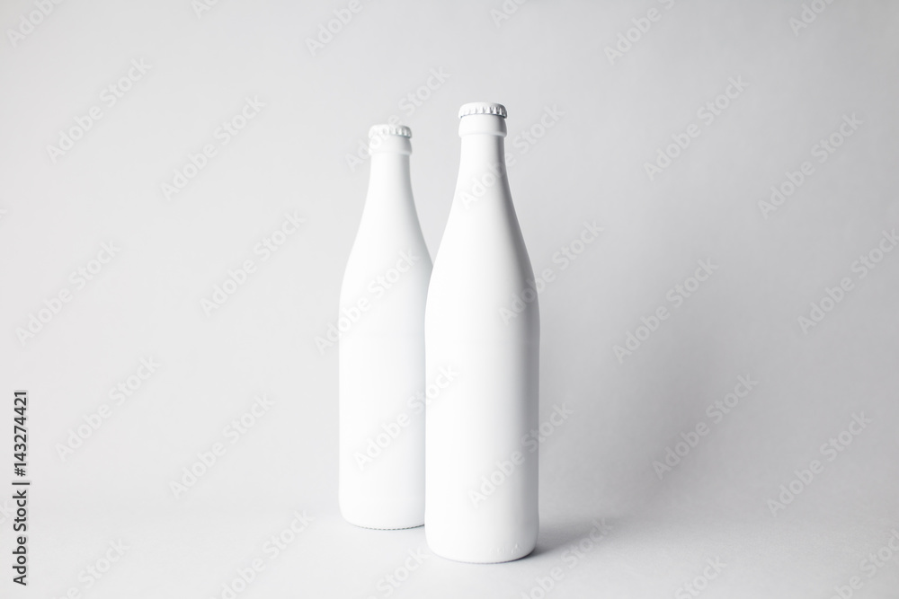 Two beer bottles on the scene, mock-up. Two beer bottles on the scene, mock-up.