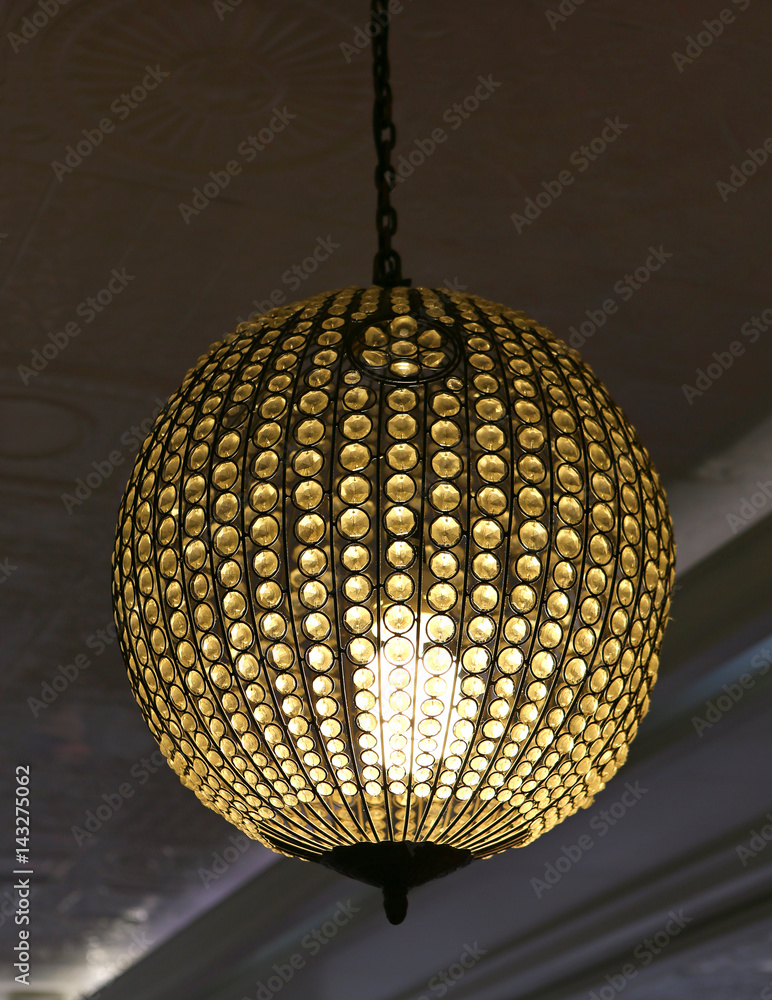 Obraz premium Lighting lamp inside crystal decor