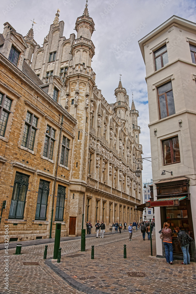 Street with Old town hall and tourists in Brussels