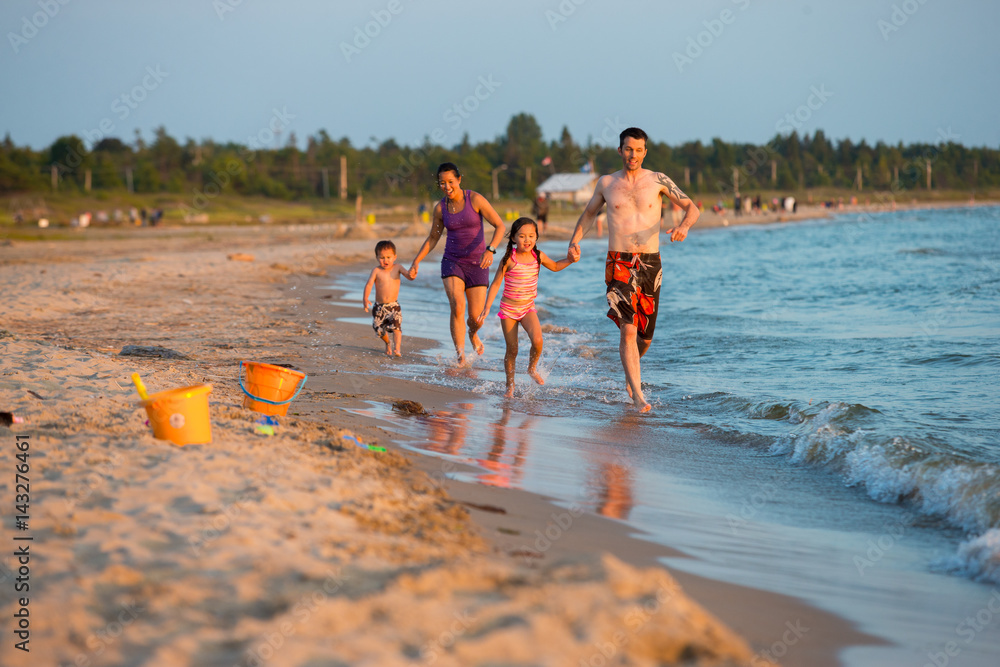 Mixed Race family at the beach