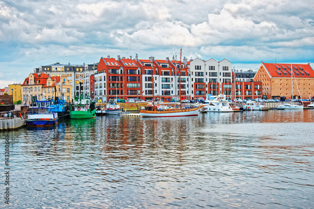 Old port with boats at Waterside in Motlawa River Gdansk