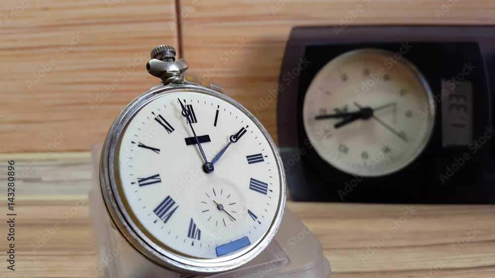 Many Clocks Timelapse.On a wooden background Many Clocks Timelapse.On a wooden background