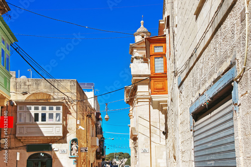 Traditional architecture of buildings in street in Rabat