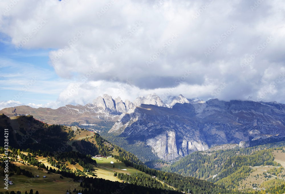 Autumnal landscape of the italian Alps seen from Sella Pass, Dolomites, Northern Italy, Europe Autumnal landscape of the italian Alps seen from Sella Pass, Dolomites, Northern Italy, Europe