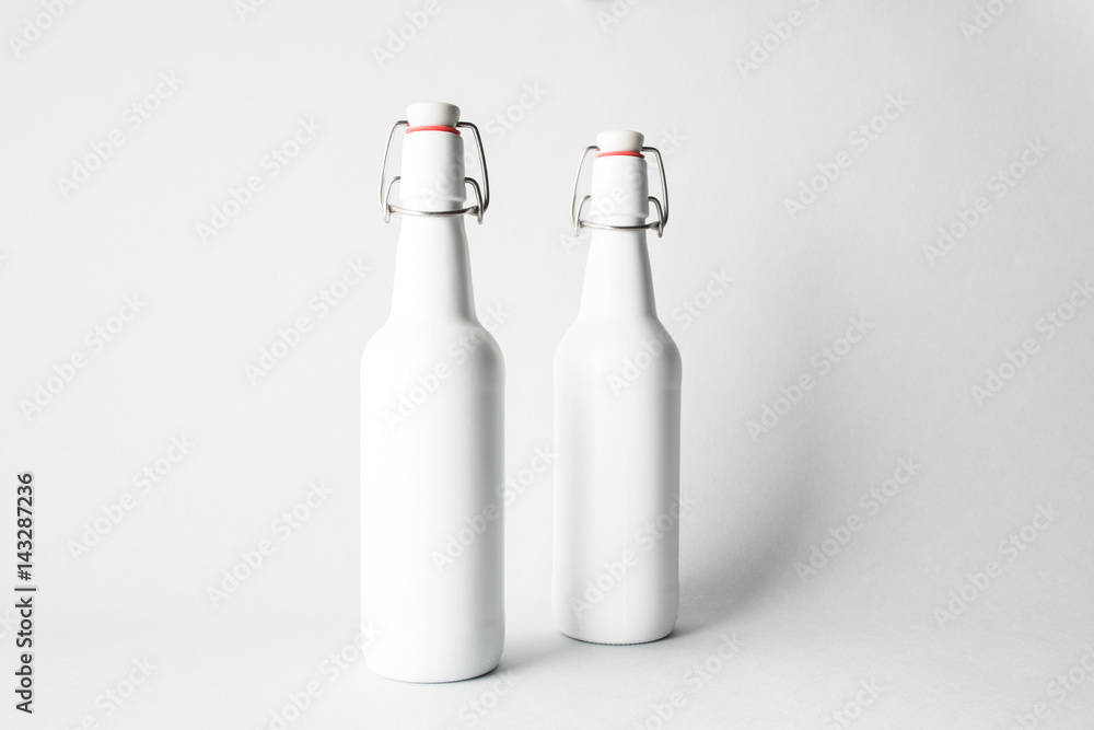 Two beer bottles on the scene, mock-up. Two beer bottles on the scene, mock-up.