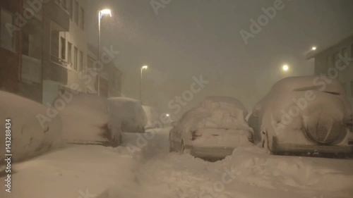 Abandoned car in snow covered streets whiteout blizzard Reykjavik Iceland.mov