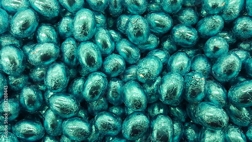 Chocolate candy Easter egg wrapped in blue foil