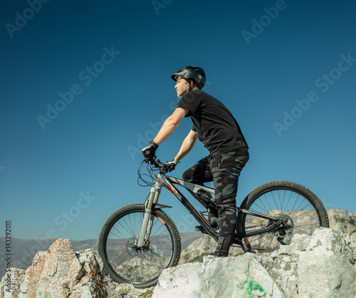 Young man with an offroad bike outdoors © Ljupco Smokovski