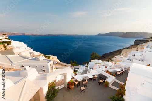 view of volcano caldera with white houses and Aehan sea waters, Santorini island, Greece