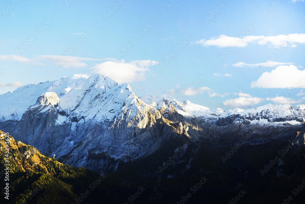 The ridge of Marmolada  mountain in autumn.
Marmolada  (3343 m) is a mountain in northeastern Italy, the highest mountain of the Dolomites range, Italy, Europe
