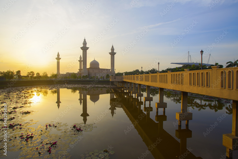 Reflection of beautiful Ampuan Jemaah mosque during sunrise.