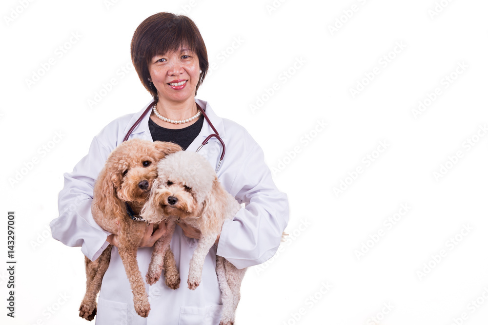 Smiling Asian female veterinary doctor hugging pet dog Smiling Asian female veterinary doctor hugging pet dog