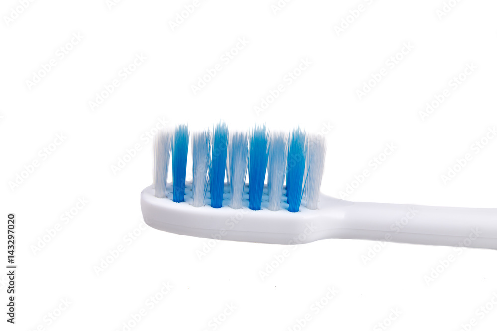 Closeup of small head toothbrush with soft slim tapered bristle Closeup of small head toothbrush with soft slim tapered bristle