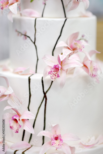 Traditional anniversary/wedding multi-layer cake with flowers