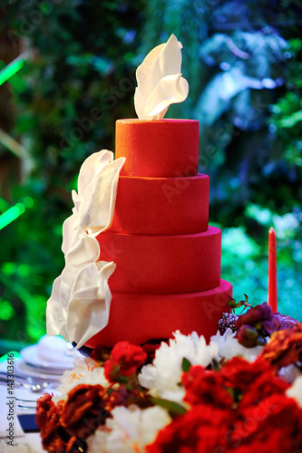 Traditional anniversary/wedding multi-layer cake on sweet table