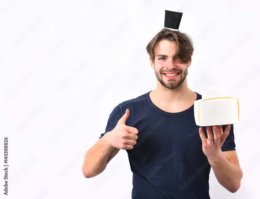 Caucasian sexy young macho holding male box with coffee cup Caucasian sexy young macho holding male box with coffee cup
