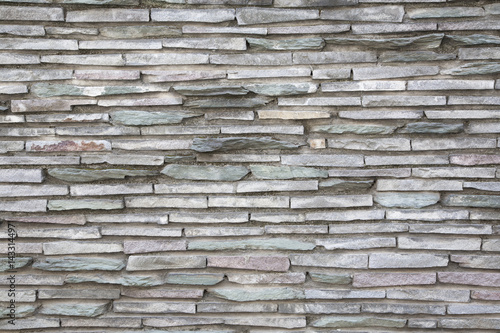 Old color stone block wall texture for background and wallpaper