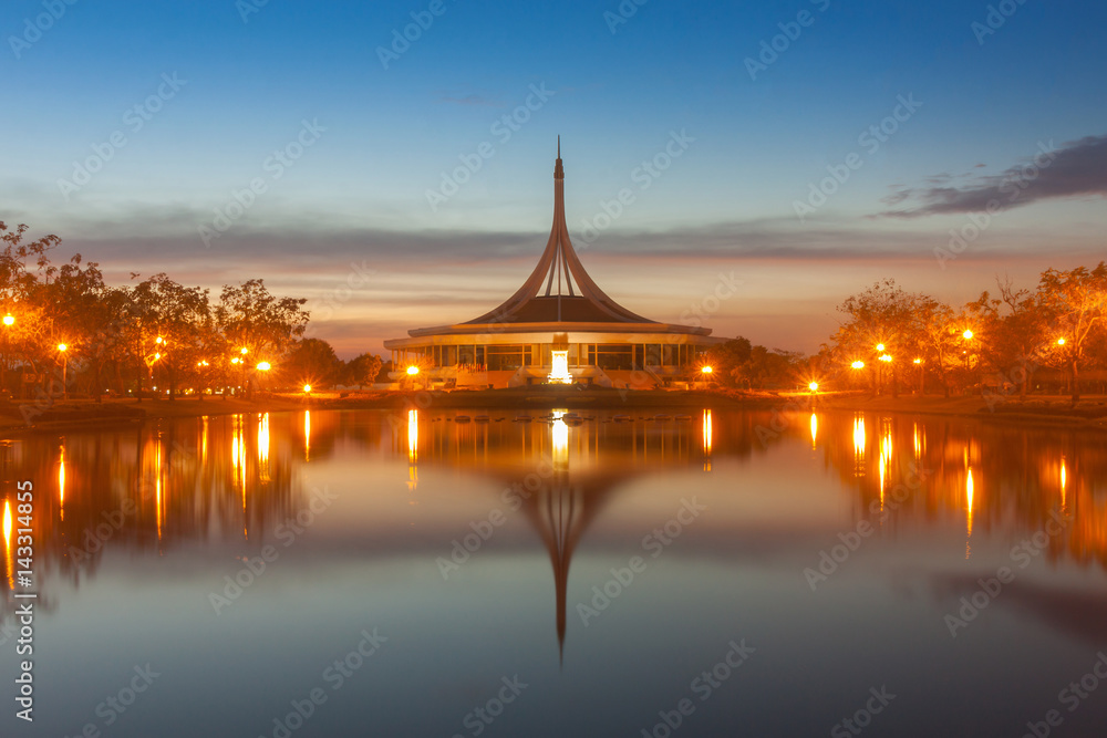 Fototapeta premium Monument in public park of thailand. Twilight shooting reflection on water concept at the Suanluang Rama 9, Thailand