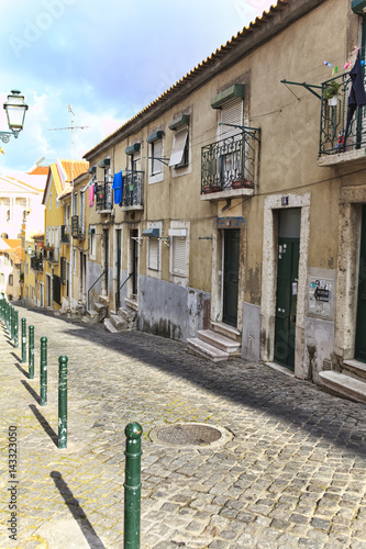 Fototapeta Naklejka Na Ścianę i Meble -  Street  in old town of Lisbon, Portugal