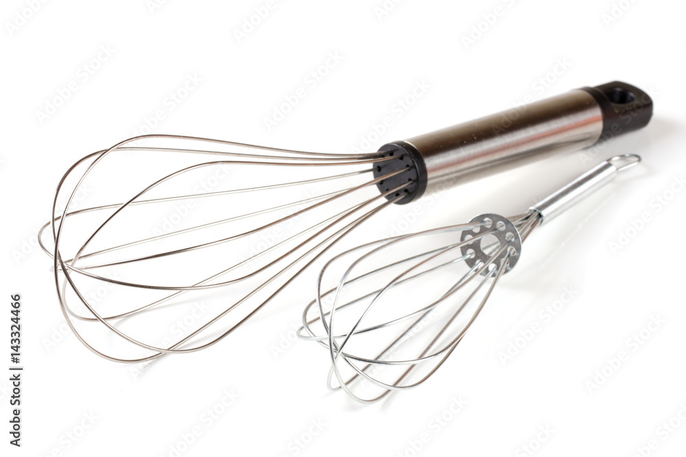 large and small metal whisk for whipping isolated on white background large and small metal whisk for whipping isolated on white background