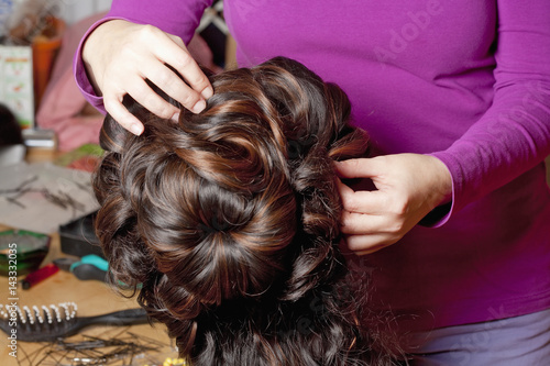 Professional Wig Maker Working in her Workshop.