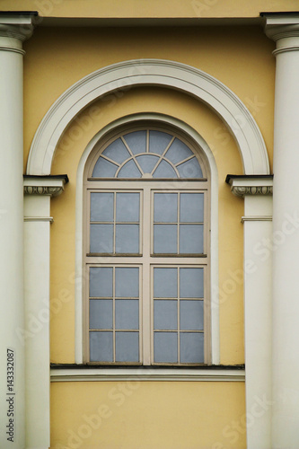 Facade of a window of an old building in the center of the city.