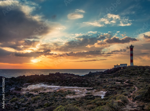 Sunset and lighthouse. Tenerife. Canary Islands, Spain