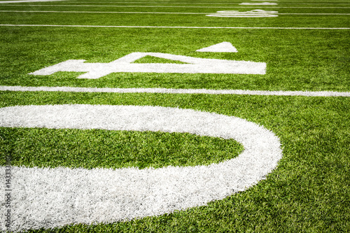 Close Up on the forty yard line on american football field with artificial turf © Victor Moussa