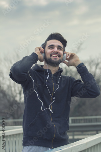 Jogger with headphones on his head