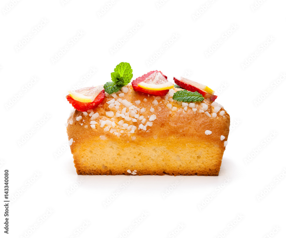 Homemade lemon loaf with strawberry slices isolated on white Homemade lemon loaf with strawberry slices isolated on white