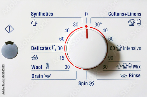 Close up washing machine dial