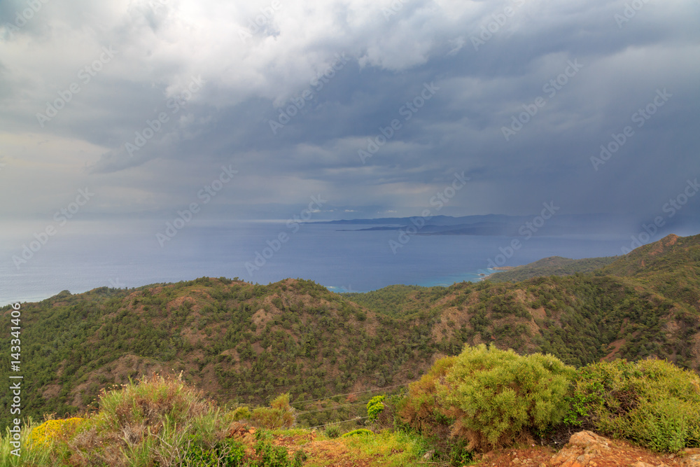Rain clouds with distance in Datca mountains