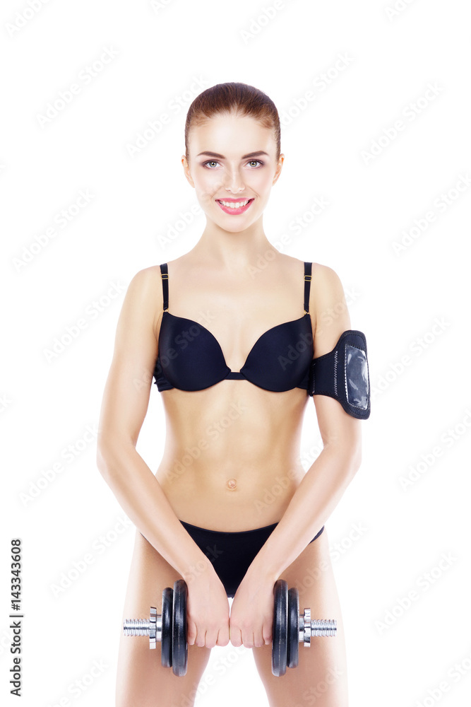 Fit, healthy and sporty woman in black swimsuit isolated on white. Beautiful girl with dumbbell. Sport, fitness, diet, weight loss and healthcare concept. Fit, healthy and sporty woman in black swimsuit isolated on white. Beautiful girl with dumbbell. Sport, fitness, diet, weight loss and healthcare concept.