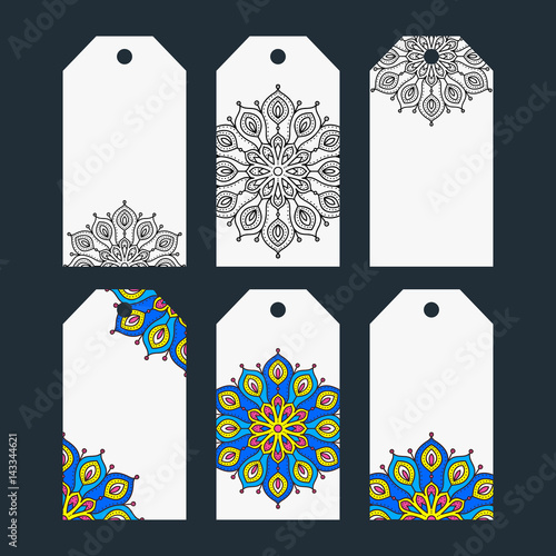 Set of six printable tags with hand drawn decor. Isolated. Collection of label with doodle mandala ornament. Outline and color elements. White, blue, yellow, black and pink colors.