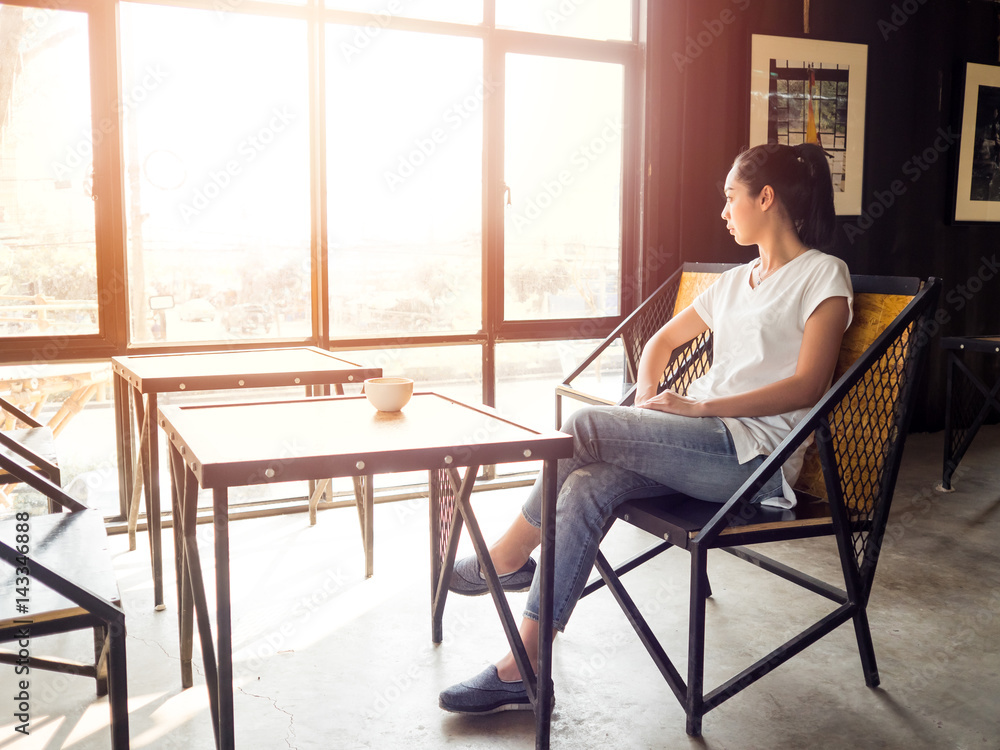 Woman takes a rest in cafe. Woman takes a rest in cafe.