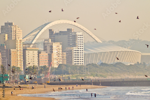 Durban beach front and pier at sunrise  photo