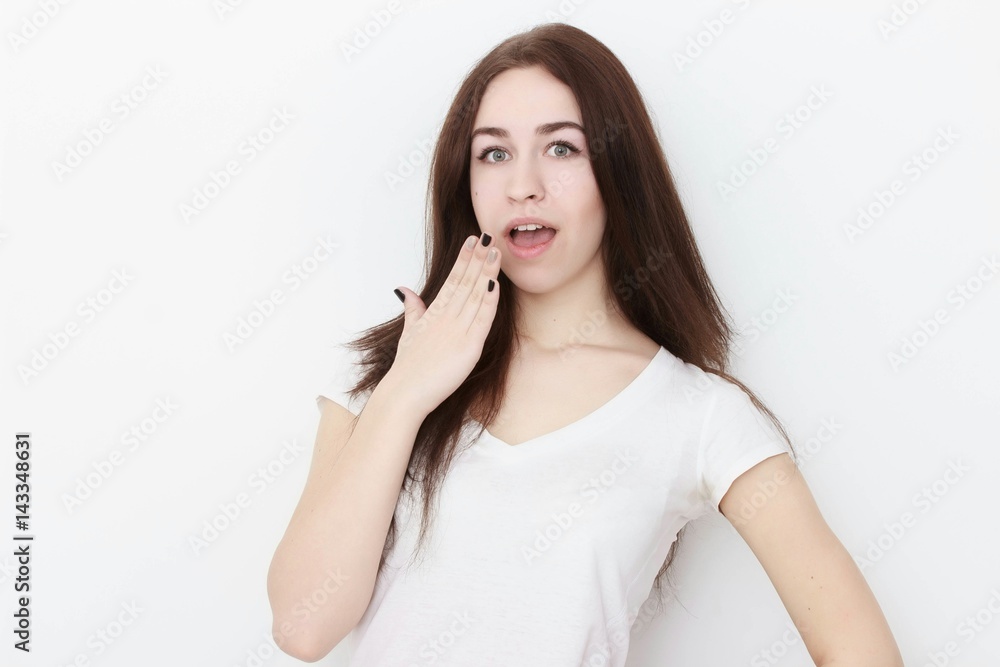 Young casual woman In pink blouse isolated over white background studio portrait Young casual woman In pink blouse isolated over white background studio portrait