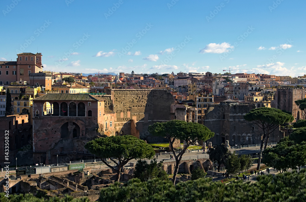 View to rooftops of Rome skyline with the Temple of Minerva which defined the Forum of Nerva in Rome