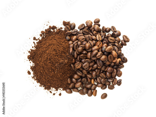 Ground and graind coffee pile over white isolated backgroud from top view