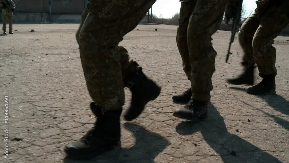 Soldiers training runs on the road. The boots only. Soldiers training runs on the road. The boots only.