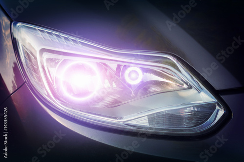 Tableau sur toile Angel eyes xenon headlight glowing optics lens