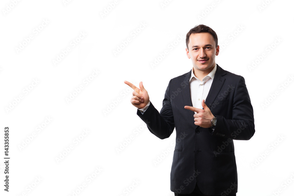 young man in a suit on a white background showing signs - obrazy, fototapety, plakaty 